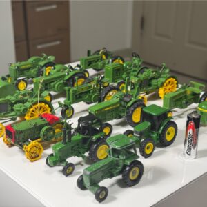 Lot of 15 Small Scale John Deere Tractors